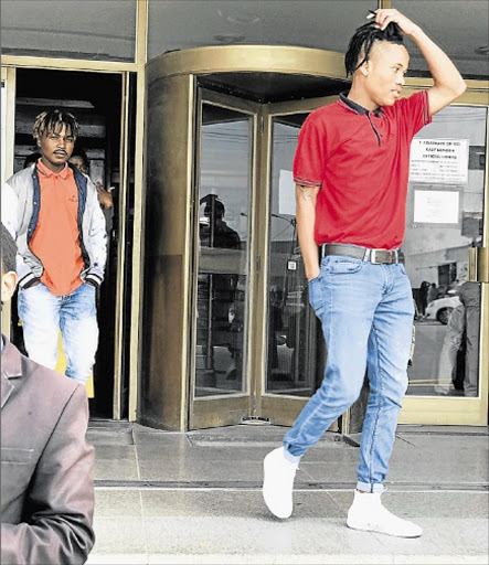 ON TRIAL: Loyiso Soldati and Sihle Jikeka leave the East London Magistrate’s Court after the trial yesterday Picture: ZWANGA MUKHUTHU