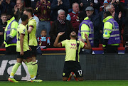 Lyle Foster celebrates scoring Burnley's third goal in their Premier League win against Sheffield United ay- Bramall Lane in Sheffield on Saturday.