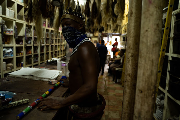 Thando Mahlangu visits a traditional African shop on Bloed Street in Pretoria to do his monthly shopping.