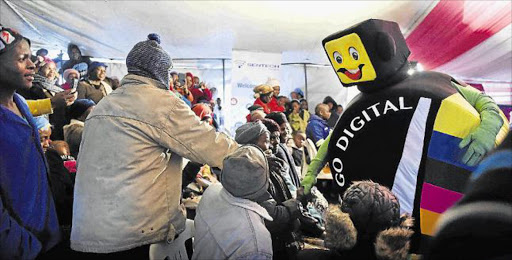 Mascot Digital terrestrial television mascot Mayihlome interacts with the audience at the Digital Migration Imbizo at the sports ground in Zibungu village