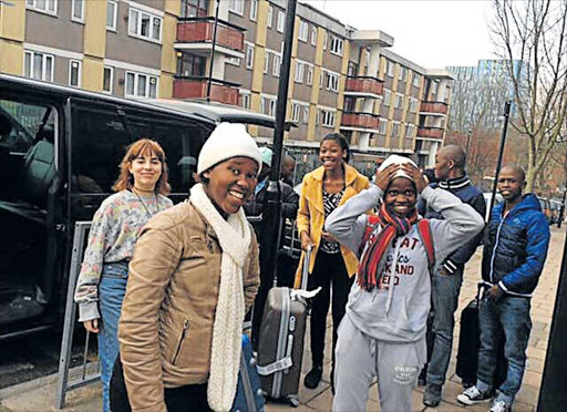 BROADEN HORIZONS: Pupils from Ntafufu Senior Secondary School in Lusikisiki Yolokazi Junda, Zethu Mkontwana and Amahle Gebuza are currently in the UK as part of a London-based student exchange charity called Both (Broaden Out Their Horizons). For all of the pupils it is their first time getting onto a plane, not to mention travelling overseas. With them is Alice Waugh, back left Picture: SUPPLIED