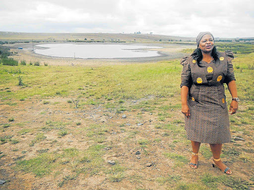 SEEKING SOLUTIONS: Water and Sanitation Minister Nomvula Mokonyane visits one of the depleted dams which supplies water to Dutywa Picture: SIKHO NTSHOBANE