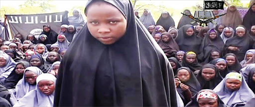 A girl, alleged to be one of the more than 200 kidnapped in Nigeria, talks to the camera at an undisclosed rural location in this screen grab from a video released by Boko Haram. The militants claim that many of the girls have converted to Islam. File photo.