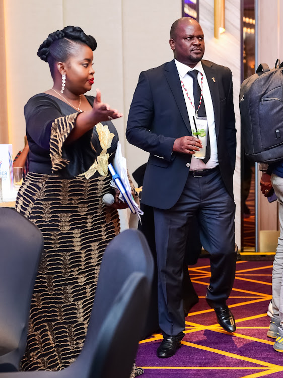 Radio Africa Group Head of electronic news Susan Kimachia interacting with Head of Content Paul Ilado during the AllAfrica Gala Dinner and Excellence Award Ceremony when Group CEO Patrick Quarcoo received the Lifetime Achievement Award at Glee Hotel in Runda, Nairobi on May 9, 2024