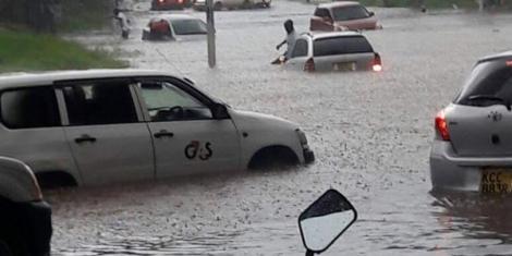 Vehicles marooned in flooded roads in Nairobi on Monday.