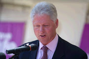 Former President Bill Clinton of the United States.  28/9/02. 
Pic. by Sydney Seshibedi. 
© ST.