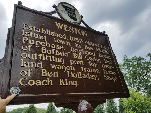 WESTON  Established, 1837; oldest ex-isting town in the Platte Purchase. Boyhood home of "Buffalo" Bill Cody; last outfitting post for over-land wagon trains; home of Ben Holladay, Stage Coach...