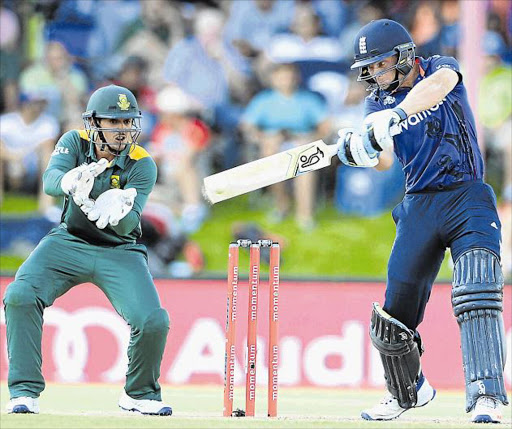 Jos Buttler, right, of England plays a shot as South Africa’s wicketkeeper Quinton de Kock attempts to take a catch during the first One-Day International Series match at Mangaung Oval in Bloemfontein yesterday Picture: GALLO IMAGES