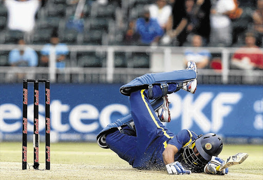 Sri Lanka's captain Tillakaratne Dilshan takes a dive. Picture: SIPHIWE SIBEKO