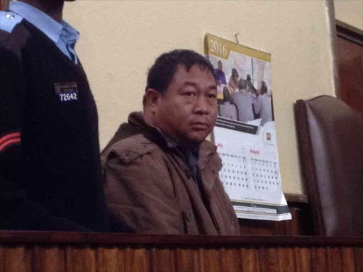 Chinese national Li Changquin at the Nakuru High Court where he was charged with the murder of tourist Luo Jinli at Masai Mara Game Reserve, August 17, 2016. /RITA DAMARY