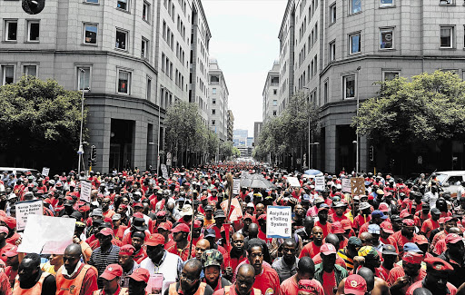 Cosatu members protest against e-tolling in Pretoria in 2012. File photo