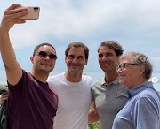 Trevor Noah, Roger Federer, Rafael Nadal and Bill Gates before the Match in Africa at Cape Town Stadium on February 7 2020.
