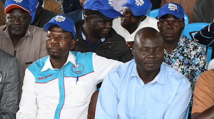 Bernard Papa (Wiper) (L) who lost in Malaba Central and Masikini Okodoi who failed to defend his Chakol South ward seat on August 4, 2022 at the Knut hall in Amagoro in Teso North.
