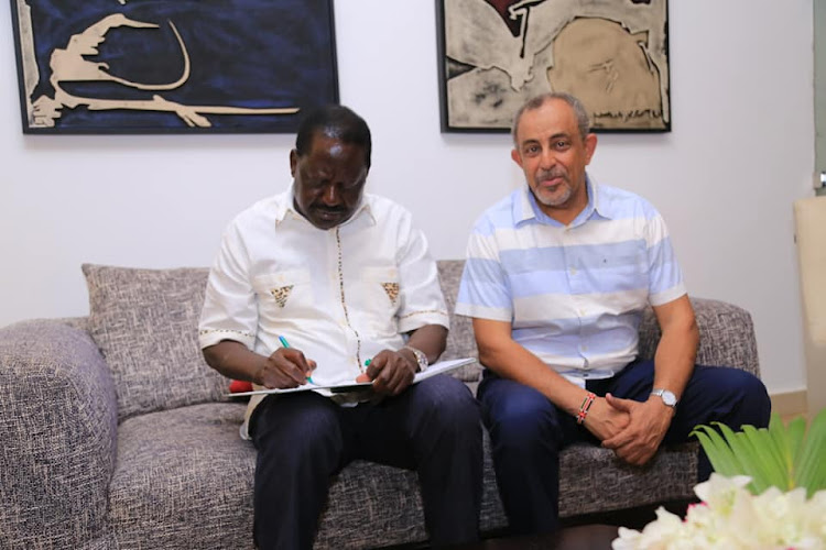 ODM leader Raila Odinga and businessman-cum-politician Suleiman Shahbal at Kilua Resort on Wednesday.