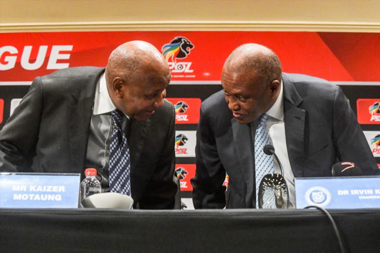 Premier Soccer League chairman Irvin Khoza (R) with the league's executive committee member and Kaizer Chiefs chairman Kaizer Motaung during a PSL press conference at Emperors Palace in the east of Johannesburg on September 20, 2018.