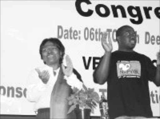 Manto Tshabalala Msimang with the director of NAPWA Mr Nkululeko Nxesi during the national congress of NAPWA in Jabavu, Soweto. Pic. Munyadziwa Nemutudi. 08/12/07. © Sowetan.