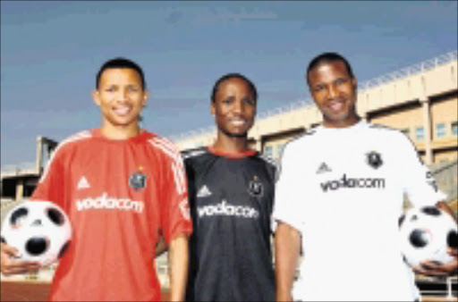 STYLING: Orlando Pirates players Excellent Walaza, Teko Modise and Innocent Mdledle display the new kit that will be used by the side next season. 20/07/08. © Sowetan.