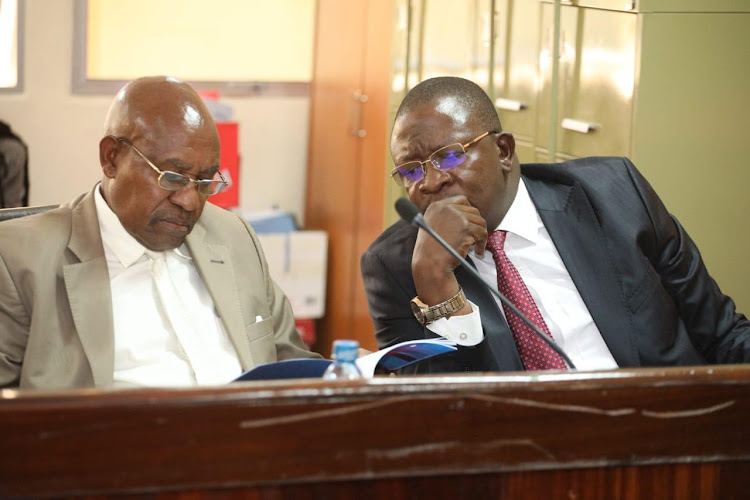 Protective Security Industry Association Chairman, Cosmas Mutava and Bedrock Security Founder, Erick Okeyo during an Internal Security Committee meeting in Parliament.