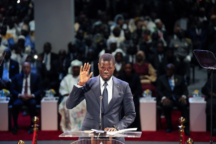 Senegal's Newly elected President Bassirou Diomaye Faye takes the oath of office as president during the inauguration ceremony in Dakar, Senegal April 2, 2024.