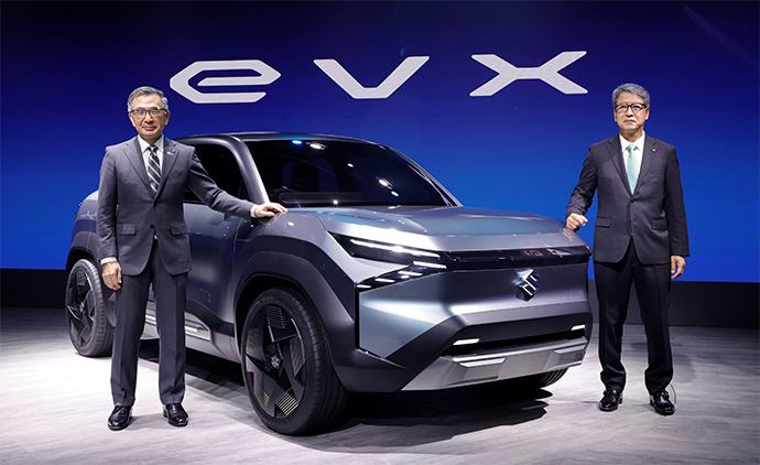 Suzuki Motor Corp director Toshihiro Suzuki, left, and Maruti Suzuki India CEO Hisashi Takeuchi with the company’s electric concept SUV — the all-wheel drive eVX — which it plans to bring to market in 2025. Picture: SUPPLIED