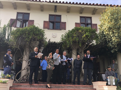 Diego Novella, second from the right at Tuesday's inspection in loco at the Camps Bay Boutique Hotel. Novella has pleaded not guilty in the High Court in Cape Town to murdering his girlfriend, Gabriela Albans, at the hotel. Picture: Ruvan Boshoff