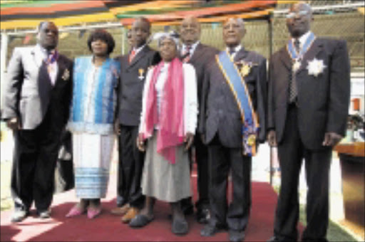 TOP HONOURS: Award recipients at the Zambian investiture ceremony at the country's 45th year of independence celebrations. In front is Getrude Nuthu Tambo (the late OR Tambo's younger sister). Pic. GARY VAN WYK. 28/ 10/2009. © Unknown.