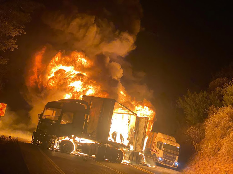 A truck is destroyed after being attacked near Van Reenen’s Pass on the N3 in KwaZulu-Natal. Picture: TABLOIDNEWSPAPER/THE LADYSMITH HERALD