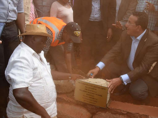 WOR K IN PROGRES: Former Mining CS Najib Balala (R) lays a foundation stone for the Sh50 million gemstone processing centre at Voi, Taita Taveta county, last year.