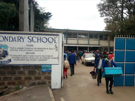 Students take away their belongings after Highway secondary school in South B was closed indefinitely following a fire on Sunday, July 22, 2018. /JOSEPH NDUNDA