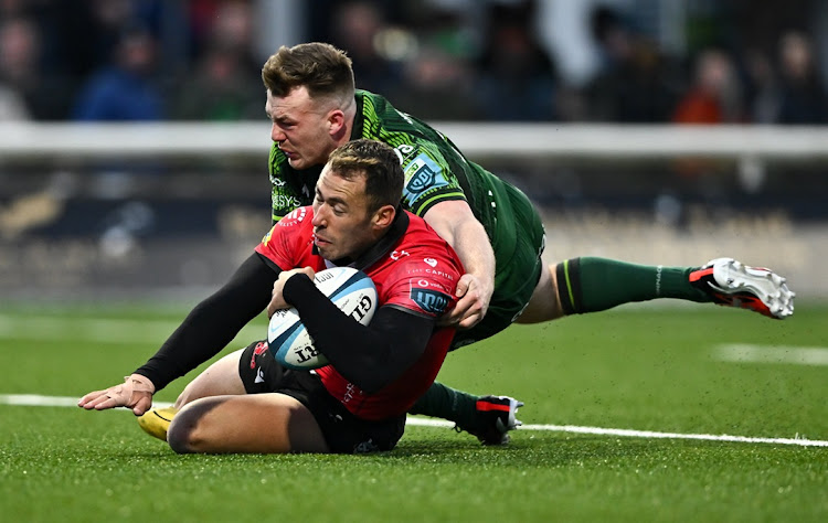 Erich Cronje scores the Lions' fourth try despite pressure from David Hawkshaw of Connacht in their United Rugby Championship match at The Sportsground in Galway, Ireland, on Saturday.