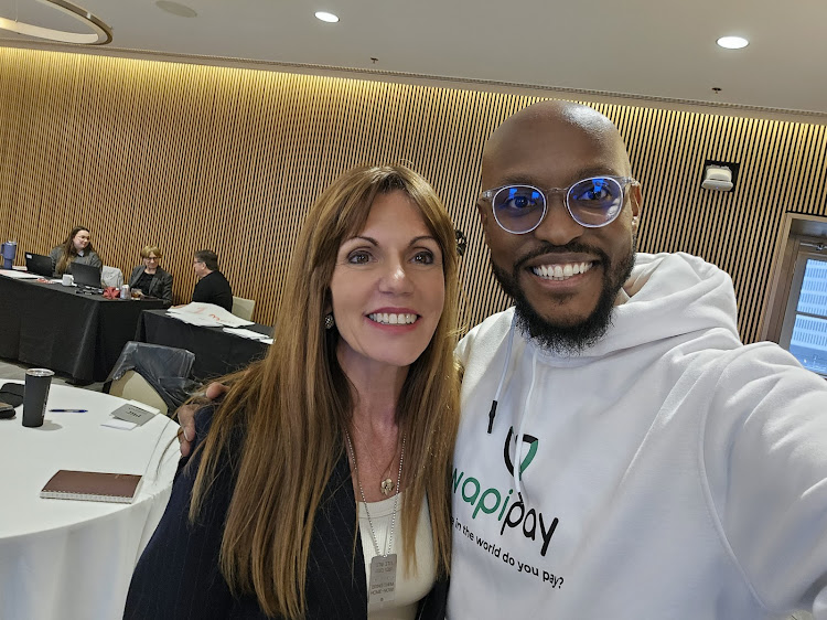 Wapi Pay Co-Founder Edward Ndichu takes a selfie with head of Google Cloud Sandra Guazzotti after holding talks.