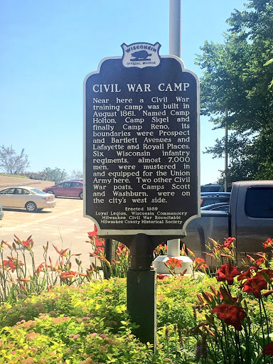Near here a Civil War training camp was built in August 1861. Named Camp Holton, Camp Sigel and finally Camp Reno, its boundaries were Prospect and Bartlett Avenues and Lafayette and Royall...