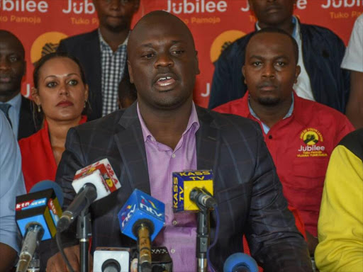 ODM youth leader Antony Kibagendi address the press at JP headquarters in Nairobi when he led ODM youths from Kitutu Chache South to decamp to the President’s party yesterday. /LEWIS NYAUNDI