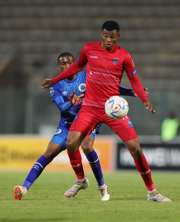 Sinoxolo Kwayiba of Chippa United is challenged by Gape Moral of SuperSport United during the DStv Premiership match at Lucas Moripe Stadium in Pretoria on Saturday