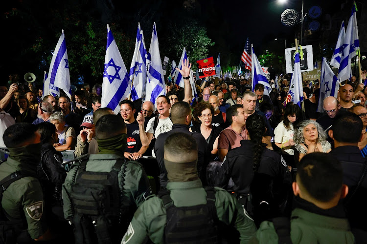 Protestors against Israeli Prime Minister Benjamin Netanyahu gather near his residence in Jerusalem on November 4. Picture: REUTERS/AMMAR AWAD