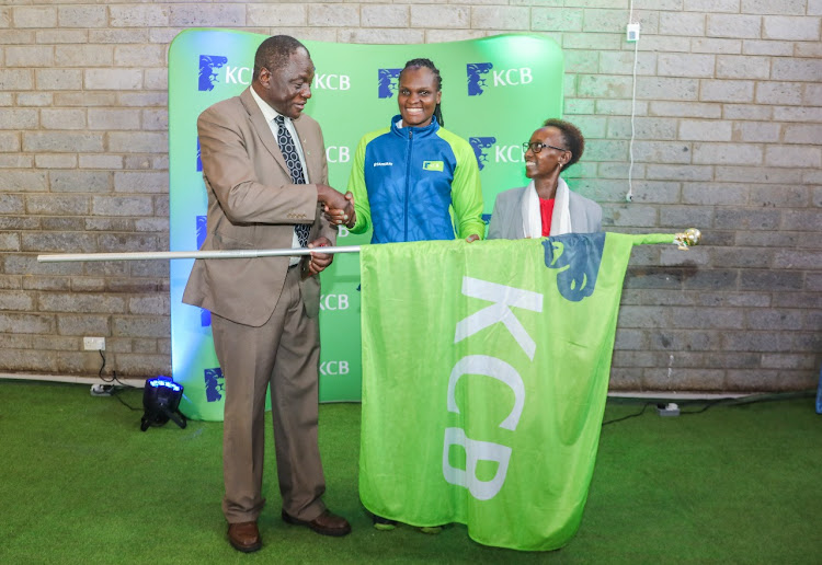 Kenya Volleyball Federation (KVF)President Charles Nyaberi, Team Captain Edith Wisa and Patron Judith Sidi during the KCB Volleyball team flag off ahead of the Africa Volleyball Club Championship games to be held in Cairo, Egypt