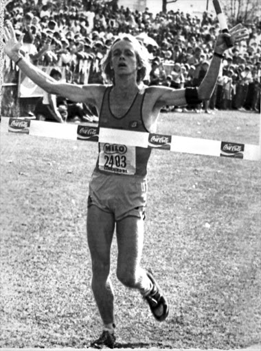 Bruce Fordyce wins the 1981 Comrades Marathon, wearing a black armband in protest against apartheid.