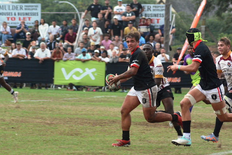 Brandwag prop and captain on the day Rémy Heymans takes on the defence with ball in hand in their schools rugby match against Daniel Pienaar in Kariega on Saturday. In support is Damian le Roux
