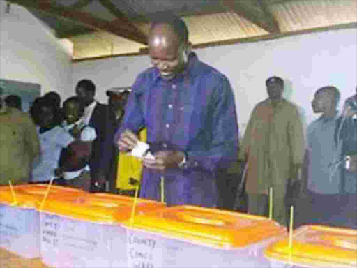 Migori governor Okoth Obado casting his vote at Rapogi Primary School on Monday Photo/Manuel Odeny