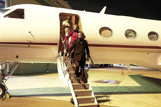 Prophet Shepherd Bushiri and his wife Mary coming out of their private jet.