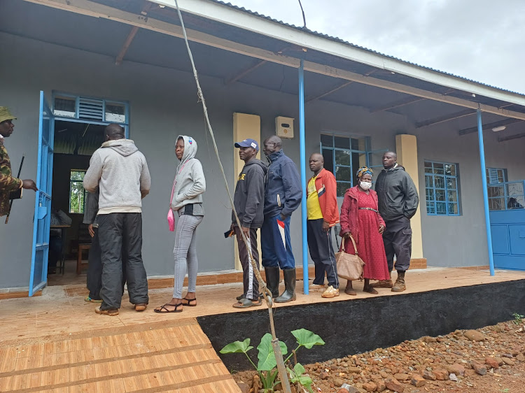 Voters line up to vote at Kojwach primary school, a polling centre in Kabondo Kasipul constituency, Homabay County on Friday, April 26, 2024.