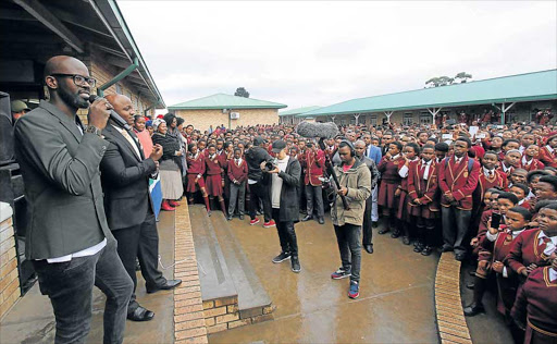 DJ Black Coffee addrssing students and teachers at his old school Zimele High School in Khwezi Township in Mthatha where he started his music career. He later official opened the computerroom and the 20 computers he donated to the school. He invested more than R200 000 for building the computer rorm and buying the computers . PICTURE: LULAMILE FENI