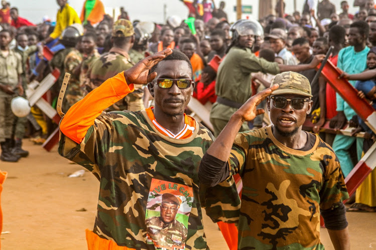 Junta supporters in Niger take part in a demonstration in Niamey, Niger, August 11 2023.