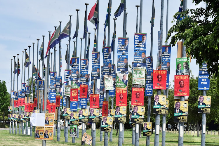 Political parties' posters on lampposts. Picture: FREDDY MAVUNDLA