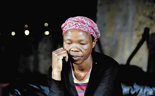 SOMBRE: Worried mother Nombeko Thole waits to hear news of her son Richard