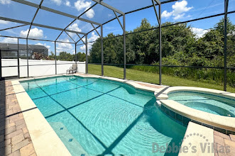 Scenic view from the sun-drenched pool deck at this Davenport vacation villa
