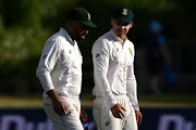 Dane Piedt and David Bedingham of South Africa walk off during day three of the Men's Second Test in the series between New Zealand and South Africa at Seddon Park on February 15, 2024 in Hamilton, New Zealand.