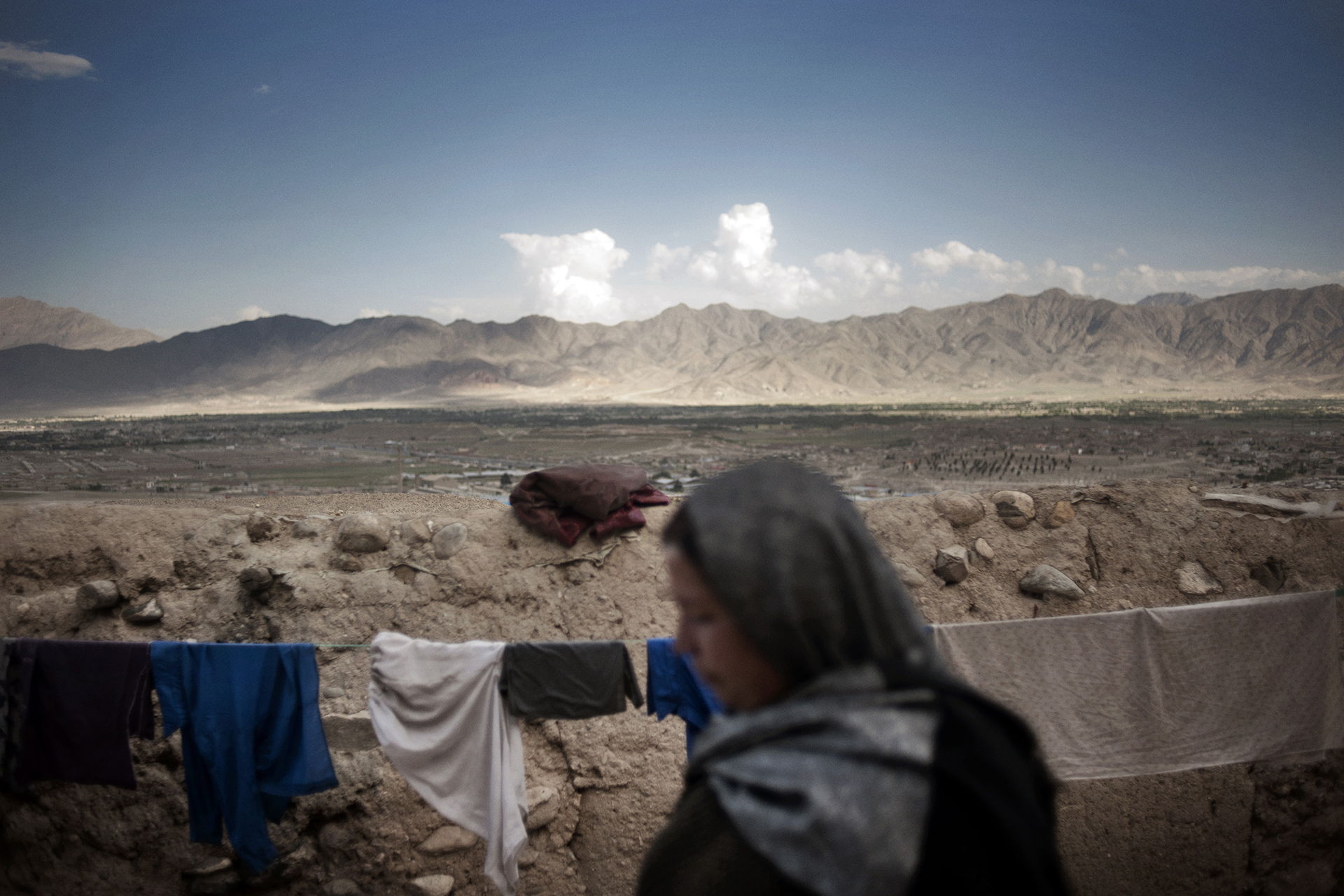 Dispossessed war widows from all over Afghanistan converged upon a steep hill and converted it by hand into a cooperative community of women and children