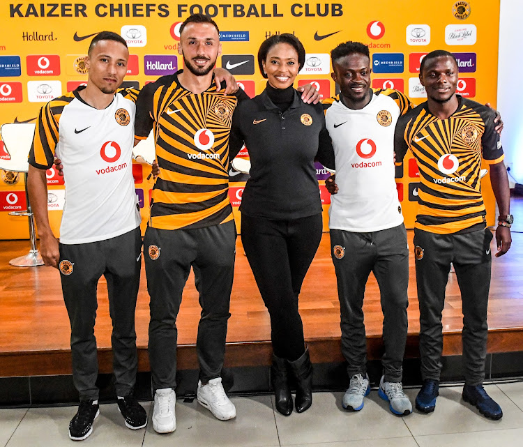 Kearyn Baccus, Samir Nukorvic, James Kotei and Lazarus Kambole of Kaizer Chiefs with Jessica Motaung during the Kaizer Chiefs kit launch at Kaizer Chiefs Village on July 23, 2019 in Johannesburg, South Africa.