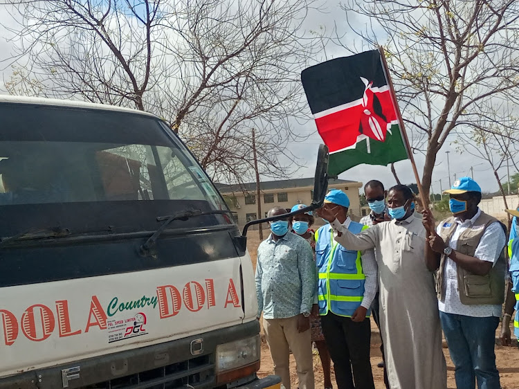 Devolution CS Eugene Wamalwa flagging off water tracking exercise to sub counties in Garissa on Tuesday.